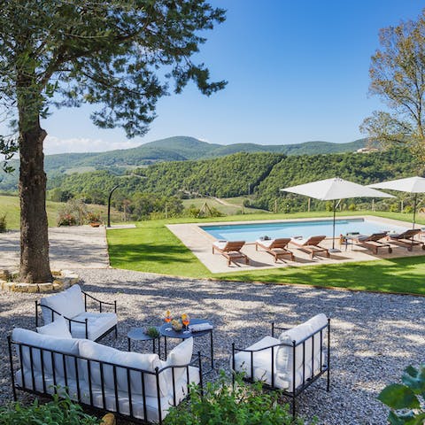 Sit in the leafy shade and admire the scenery after splashing around in your pool