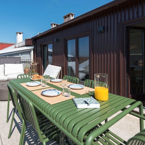 Feast on Piri-Piri chicken on the alfresco dining set out on the terrace