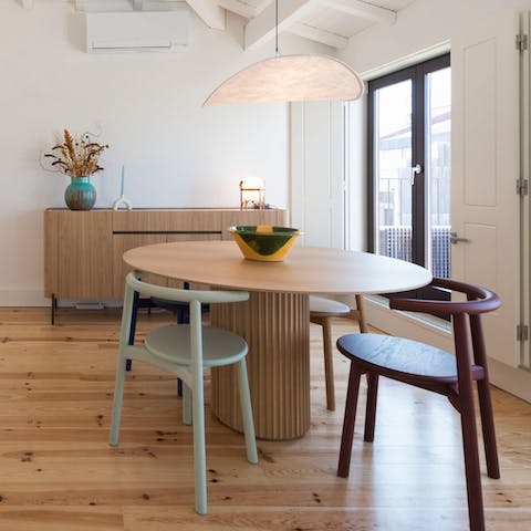 Tuck into pastel de natas around the Scandi-style dining table