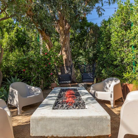 Gather around the fire pit to swap stories from the day