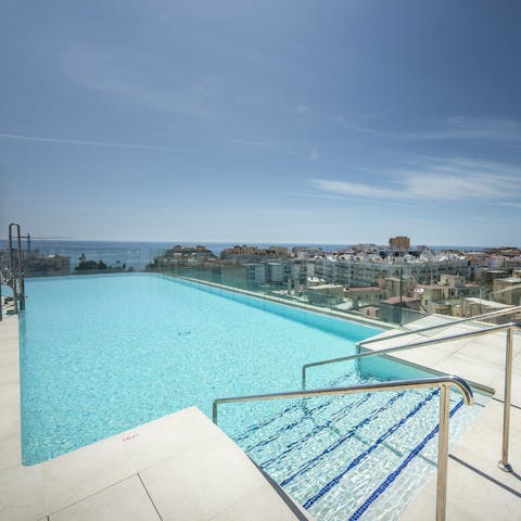 Head up to the building's rooftop pool for a swim with a view