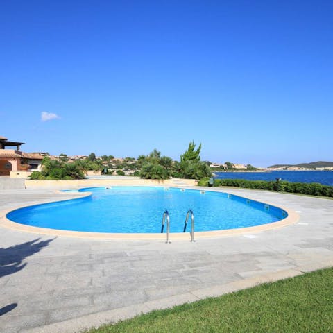Cool off in the shared swimming pool with a view