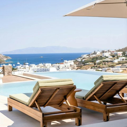 Embrace pure relaxation and beautiful views from the pool