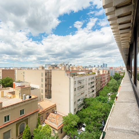 Take in the city views across tree-lined streets and rooftops