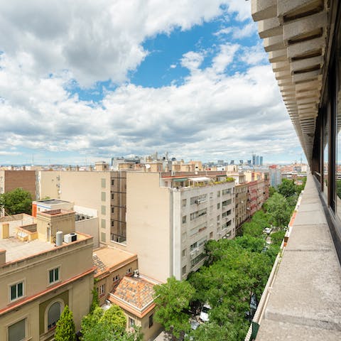 Take in the city views across tree-lined streets and rooftops