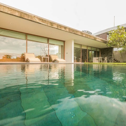 Catch up on your holiday read and relax by the sparkling, emerald pools, occasionally dipping in the pool