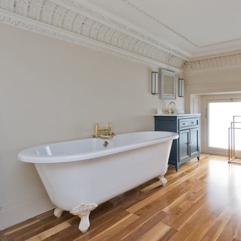 Unwind in the roll top bath tub after a day out in central London