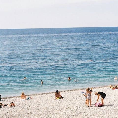 Take a dip in the waters at Gialia Beach, a five-minute walk away
