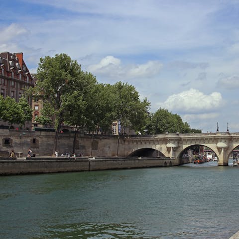 Enjoy a fresh-air-filled stroll along the banks of the River Seine