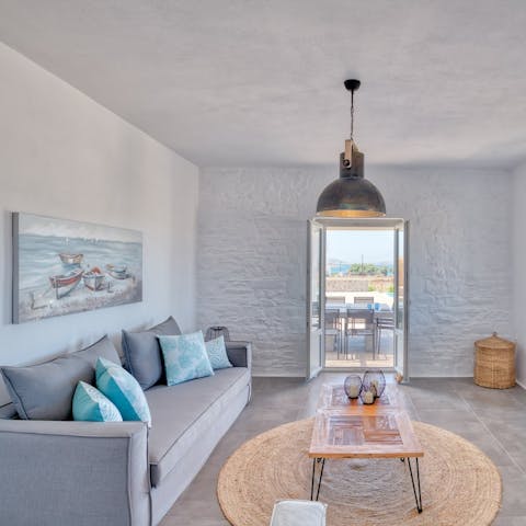 Kick back and relax on the sofa in the light-filled living room