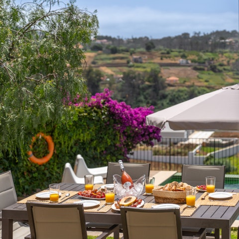 Dine alfresco with a view out to the sea