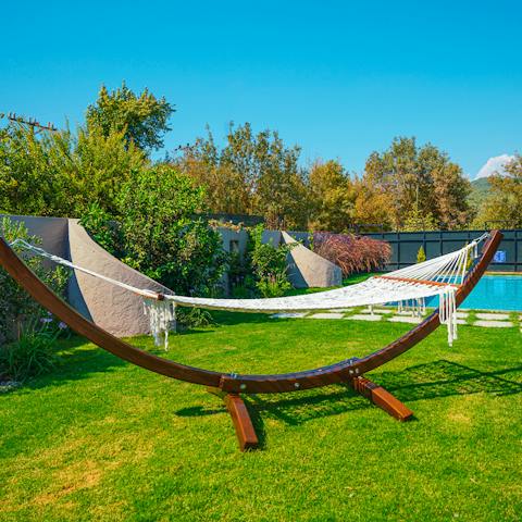 Book? Check. Cool drink? Check? Pool-side hammock? Check!