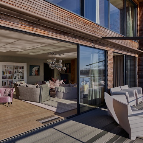 Slide open the glass doors to blend indoors with outdoors