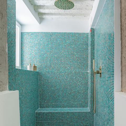 Relax after a day of adventuring in the calming rain shower