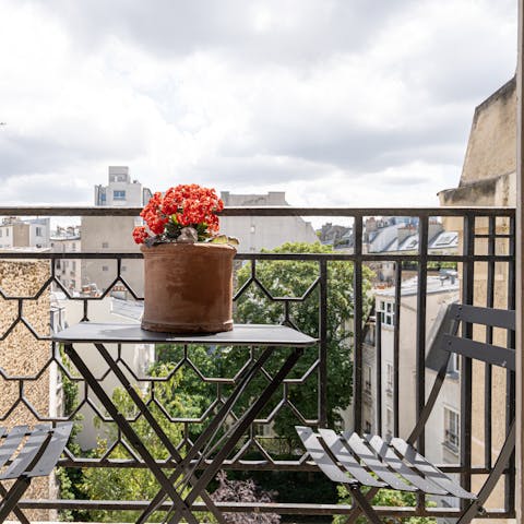 Sip your morning coffee with birds-eye views over the city