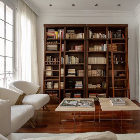 Grab a book off the shelves and unwind with a glass of wine