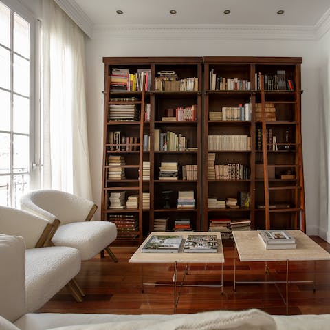 Grab a book off the shelves and unwind with a glass of wine