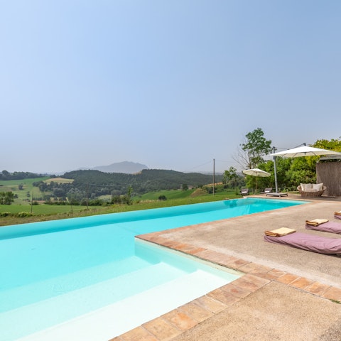 Cool off in the private pool and take in the views