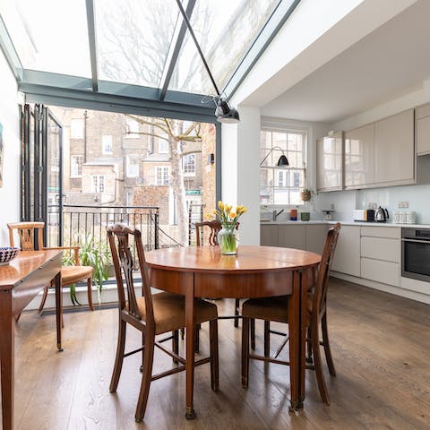 Share a meal together in the conservatory-style dining room