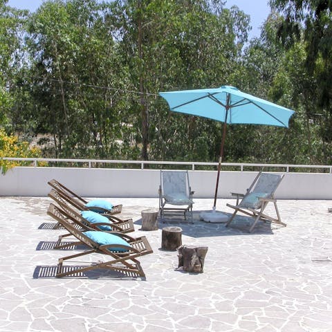 Catch up on your tan on the sun loungers