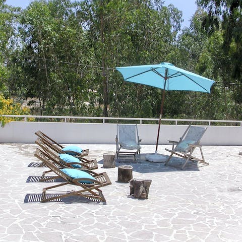 Catch up on your tan on the sun loungers