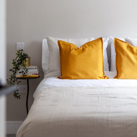 Curl up in the comfortable beds after a long day on your feet