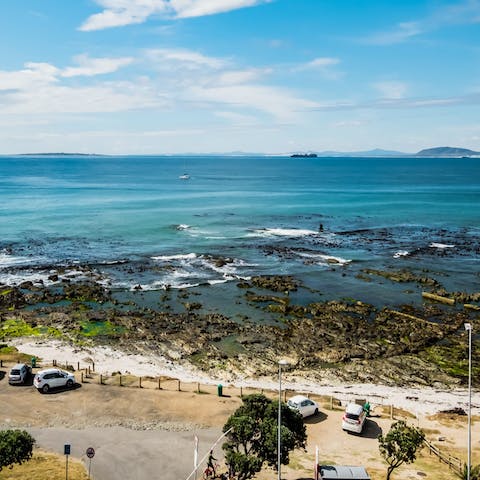 Go for a stroll on Mouille Point Beach, just footsteps from this home