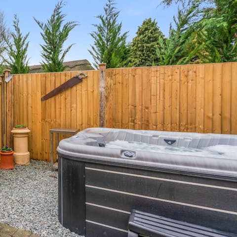 Watch the sunset together whilst having a nice soak in the hot tub