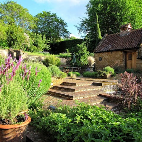 Open the double doors onto a picturesque courtyard