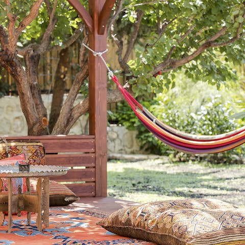 Find peace in the pavilion’s hammock