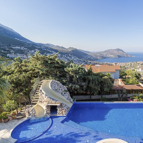 Make an entrance by sliding into the pool