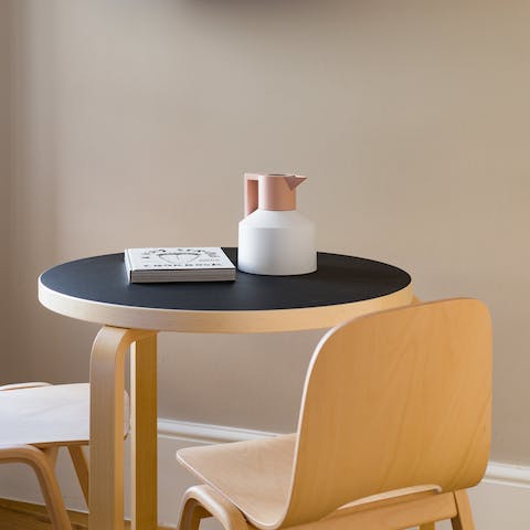 Start mornings with fresh coffee and buttered crumpets at the chic dining table