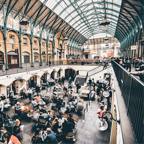 Explore Covent Garden's luxury boutiques and high-end cafés, a three-minute walk away