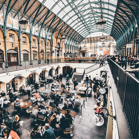 Explore Covent Garden's luxury boutiques and high-end cafés, a three-minute walk away