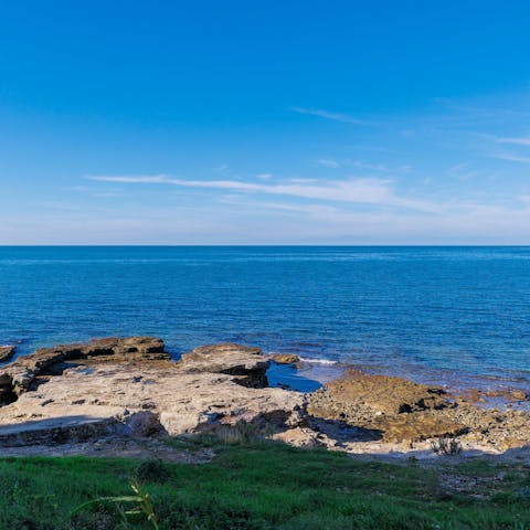 Cool off in Bašanija’s clear waters, just 400m away