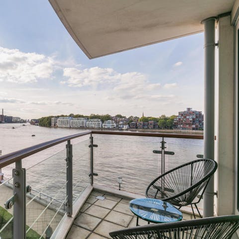 Relax on the balcony and admire the Thames views