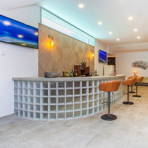 Hop up to the bar to toast an enjoyable holiday