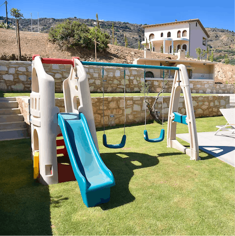 Let little ones run wild on the play equipment in the private garden