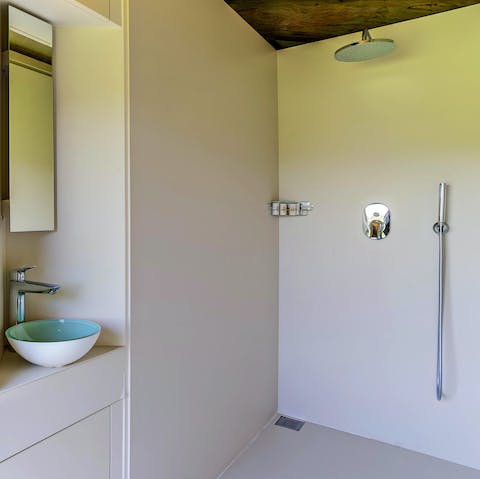 Freshen up in the stylish rainfall shower