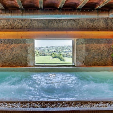 Gaze out from the windows of your private spa