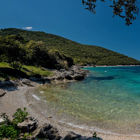 Explore the rocky coves of the beach under the villa, a stone's throw away