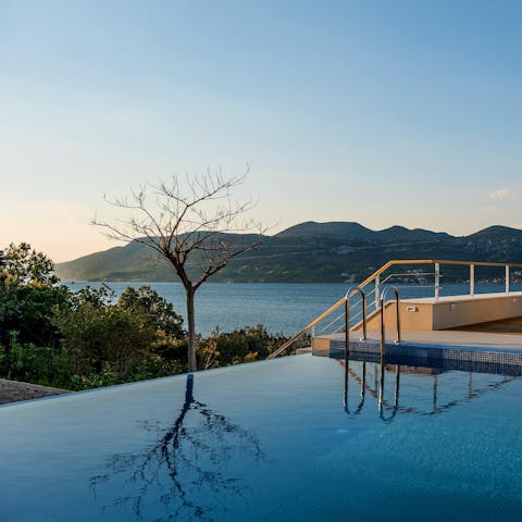 Admire the ocean views as you cool off in the infinity pool