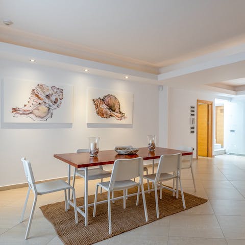 Share plates of souvlaki on the wooden dining table