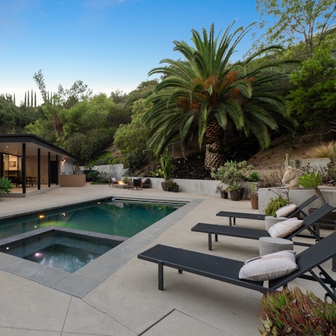 Chill by the private pool – it's surrounded by privacy landscaping