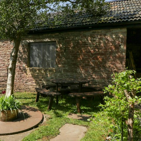 Enjoy a moment of peace at the garden table