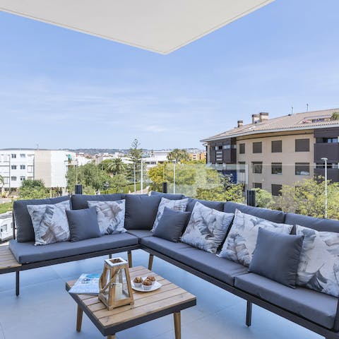 Sip sangria as you delve into a book on the balcony