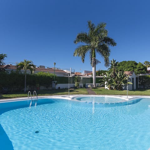 Pad down to the shared pool for a cooling dip
