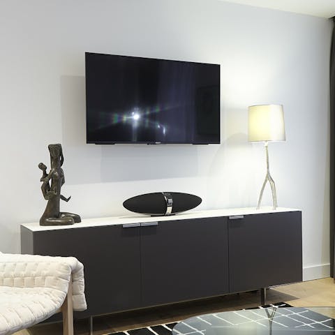 Upgrade movie night with the flatscreen TV and state-of-the-art speaker