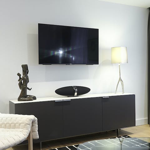 Upgrade movie night with the flatscreen TV and state-of-the-art speaker