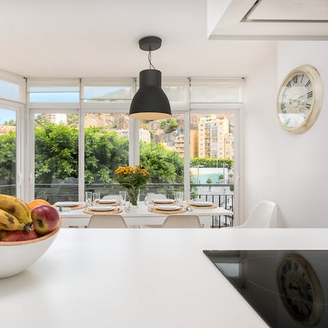 Watch the sunset while preparing dinner in the minimalist kitchen